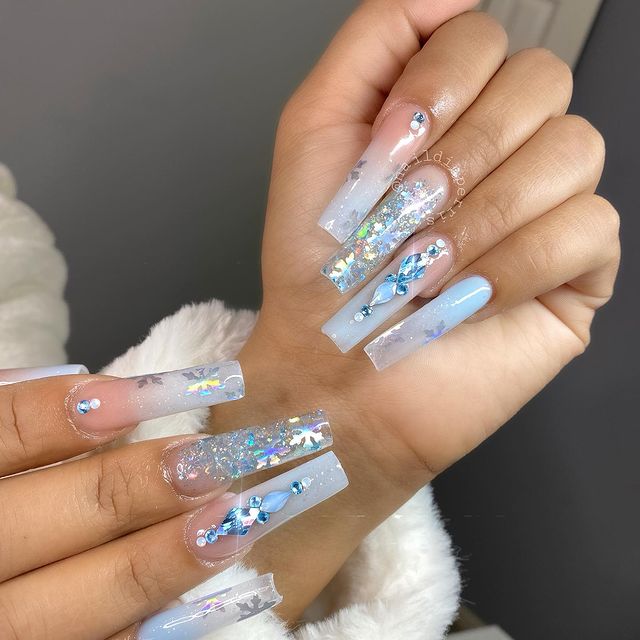 Pale Blue Ombre Nails with Sparkly Decals