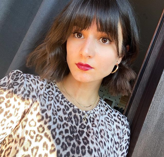  Cute Chin-Length Bob with Curtain Bangs